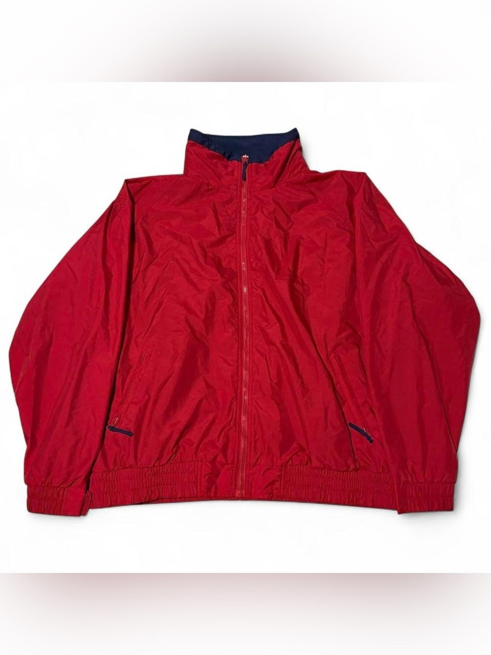 Port authority red windbreaker jacket with navy blue accents